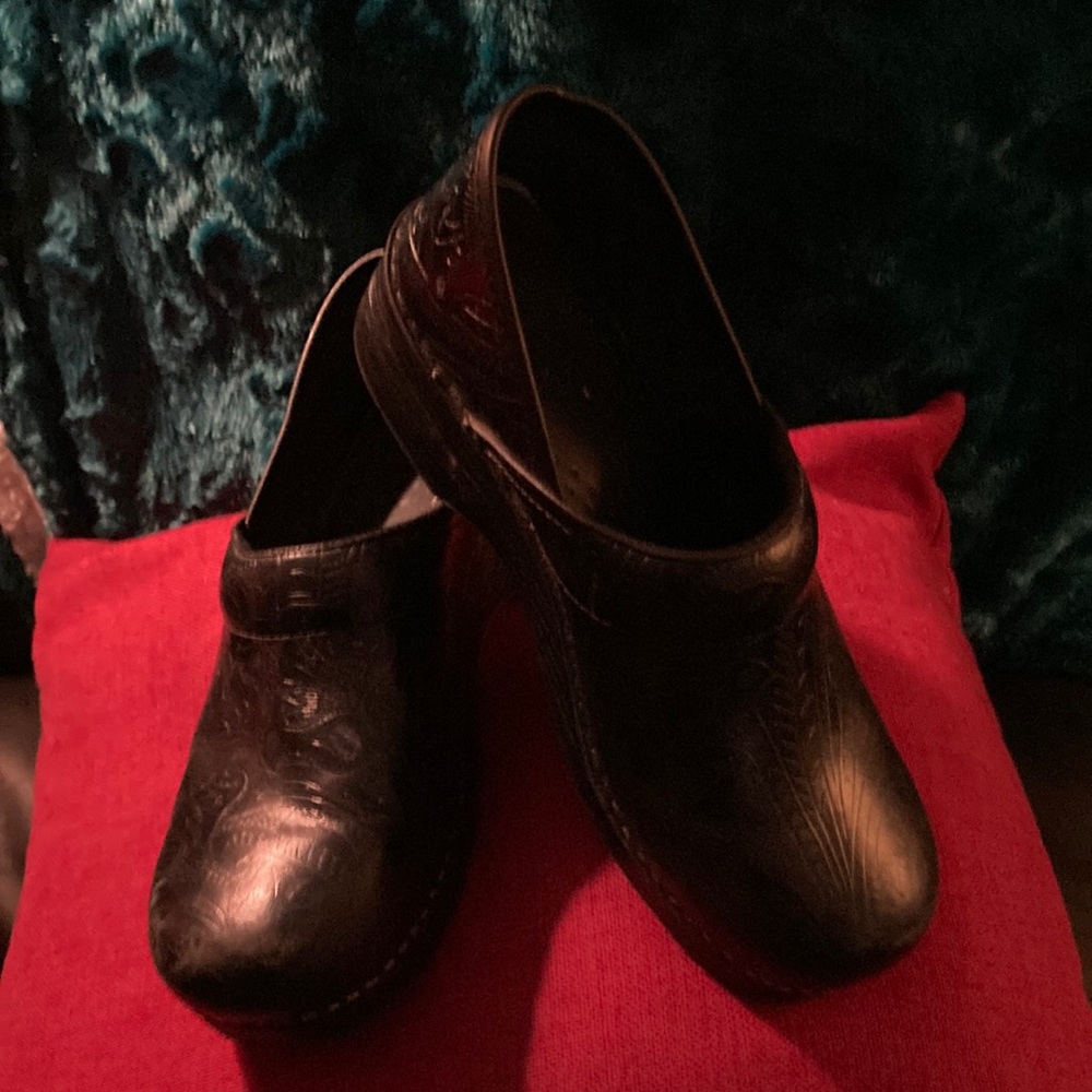 Gently used Black Paisley design Dansko clogs.
